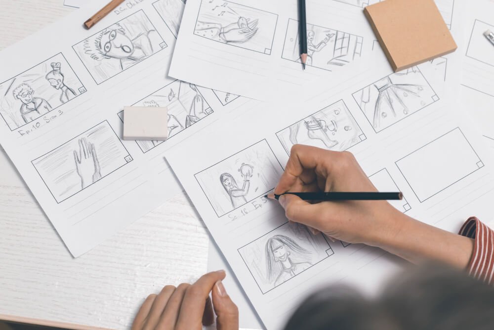 A visual illustrator storyboarding an animation project.